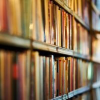 pexels-photo-2952871-2952871 Close-up view of library shelves filled with books, ideal for concepts of education and literature.